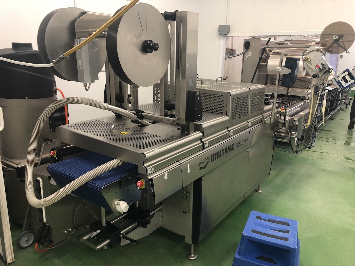 Used Multivac R275mf skin-pack thermoformer with automatic labelling machine