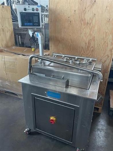 Used Cozzoli GW24 Washer, set for 100 ml vials
