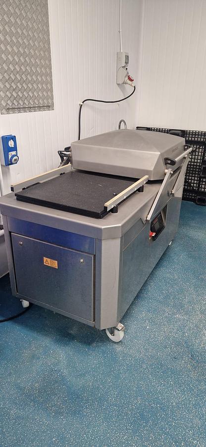 Used Webomatic Swing lid vacuum packer