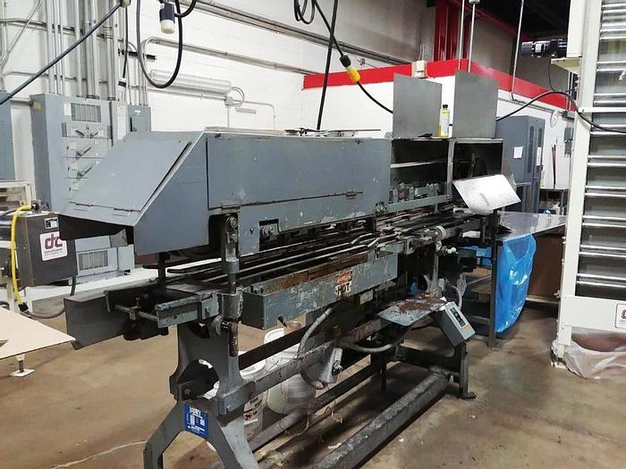 Used Burt AU-611 Roll thru labeler set for 401 cans