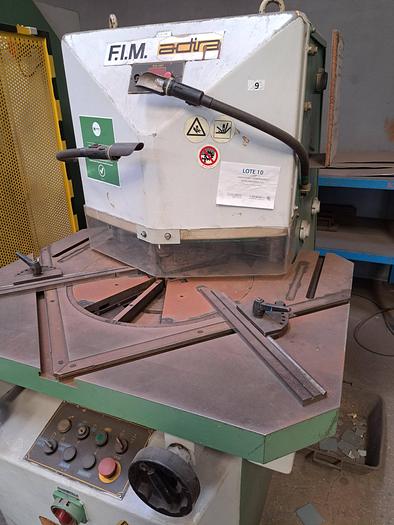 Used Máquina de cortar cantos ADIRA