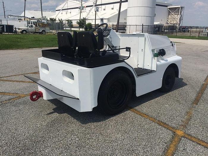 Used 1999 TUG MI60-13 baggage tow tractor. Power Steering. Zero-timed engine.