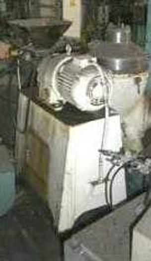 Used 4 IN.  X 14 IN. EXTRUDER – S/S