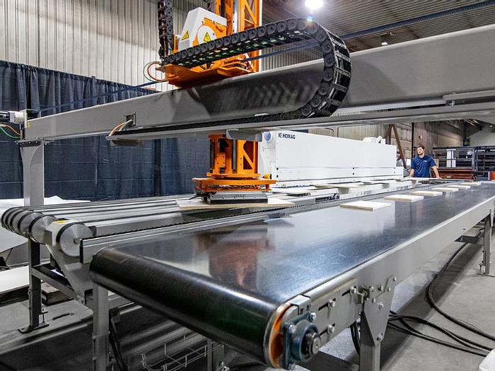 Doucet Retyx Intelligent Panel Return Conveyor System