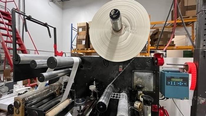 Used 13" WIDE ROTOFLEX SLITTER REWINDER WITH 2 STATION DIE CUTTING