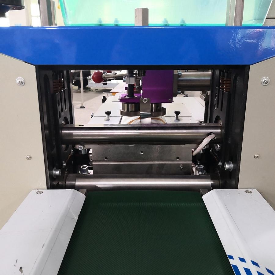 Protective clothing packaging machine