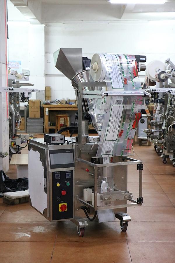 Hair dye powder packaging machine