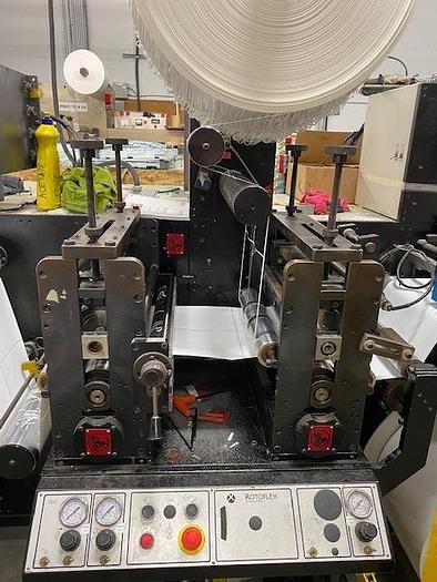 Used 13" WIDE ROTOFLEX DLI REWINDER WITH 2 STATION DIE CUTTING - RECENT DRIVE UPDATE