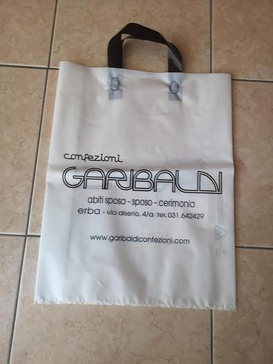 Used 2001 De Benardi 100 E SH 9 for the production of film soft loop handles bags