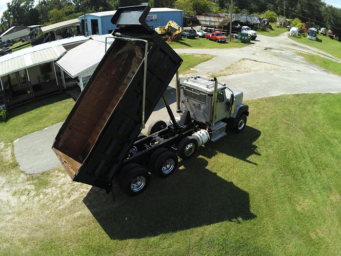 Used 2016 CATERPILLAR FACTORY DUMP TRUCK