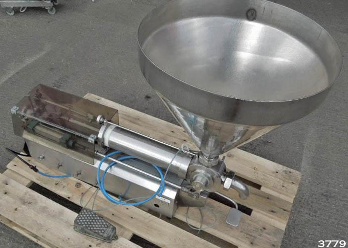 Used Universal Posifill liquid filling machine