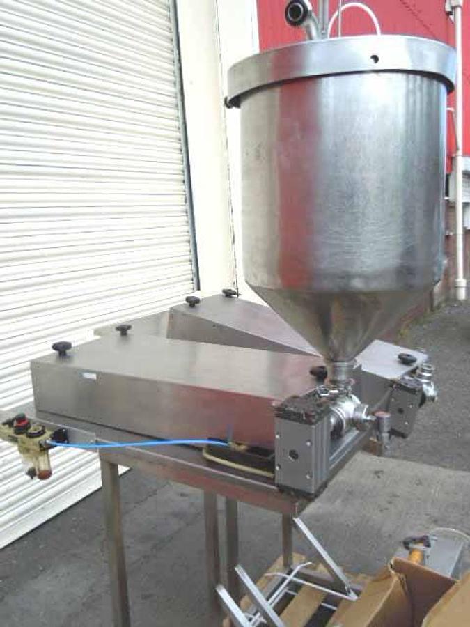 Used Adelphi single head filler