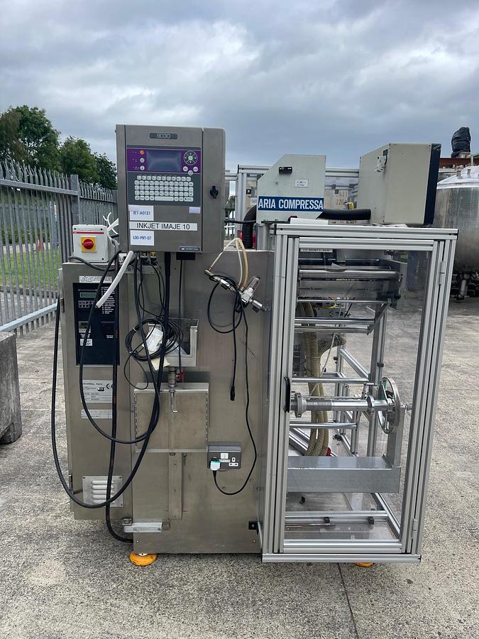 Used Universal Pack Beta S-Q 2 head liquid sachet filler