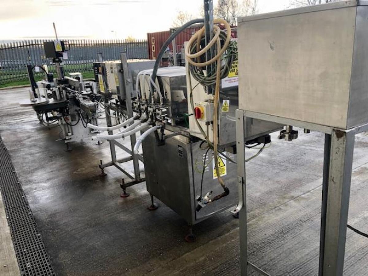 Used King 4 head liquid filling and capping line