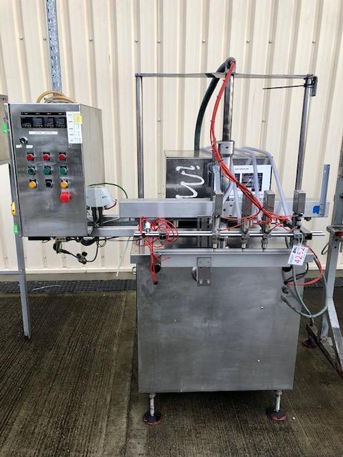 Used King 4 head liquid filling and capping line