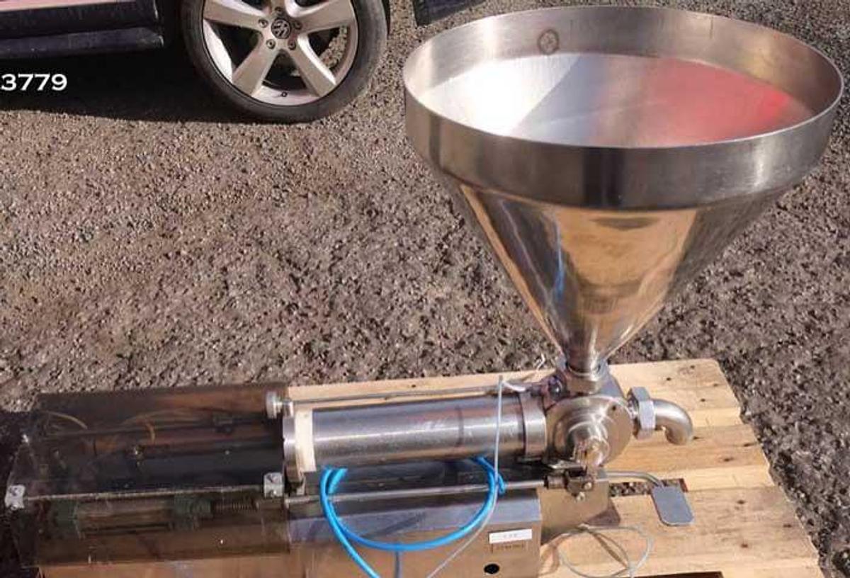 Used Universal Posifill liquid filling machine