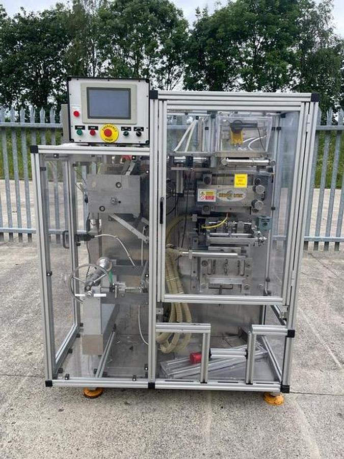 Used Universal Pack Beta S-Q 2 head liquid sachet filler