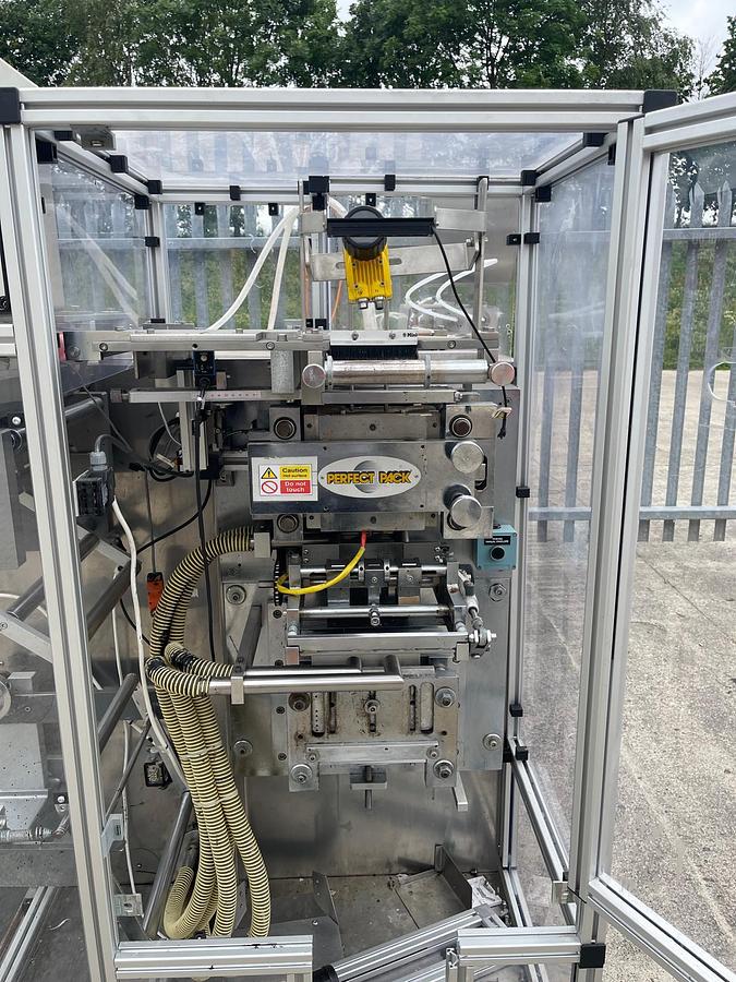 Used Universal Pack Beta S-Q 2 head liquid sachet filler