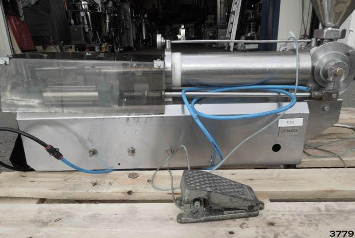 Used Universal Posifill liquid filling machine