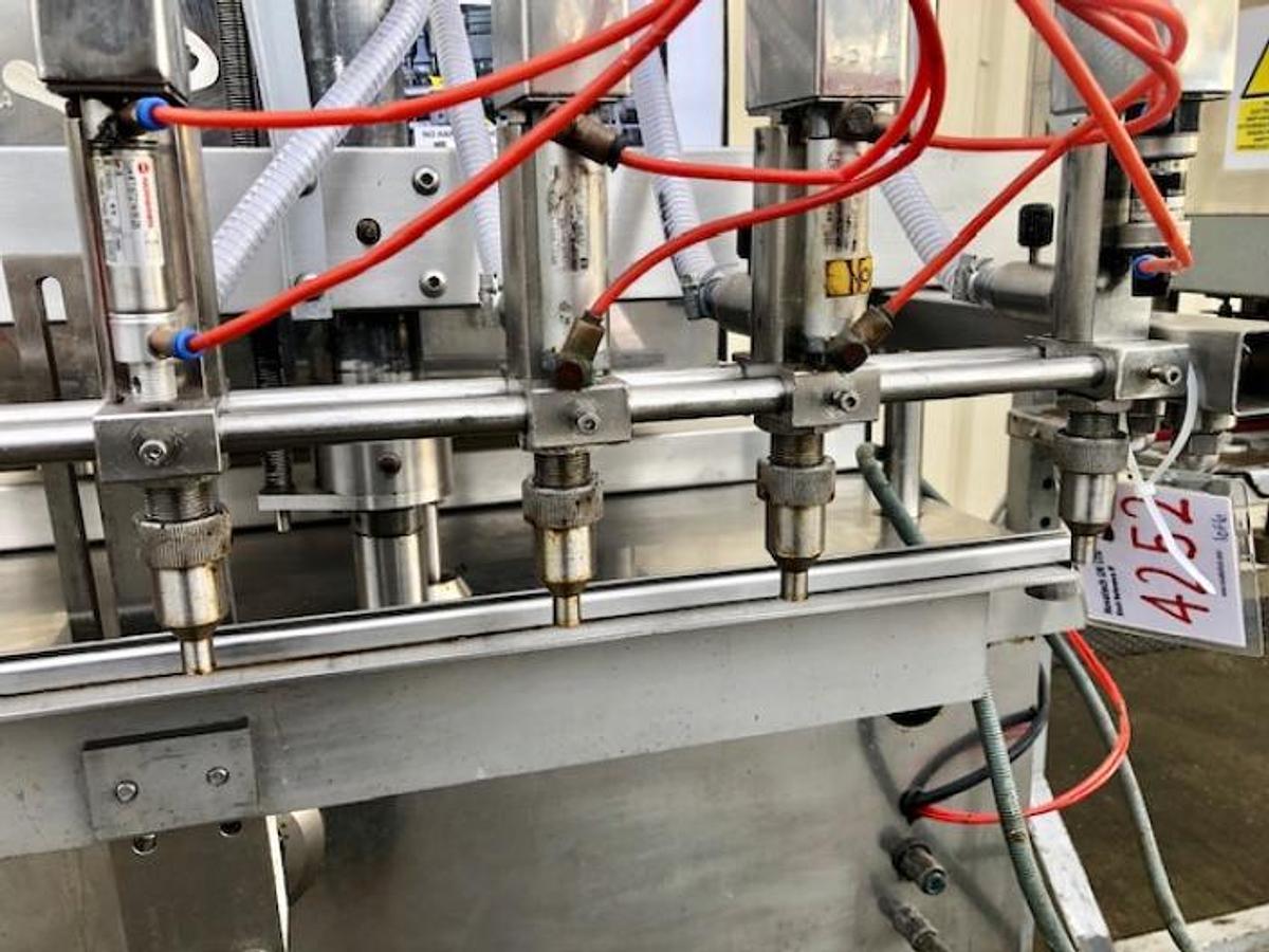 Used King 4 head liquid filling and capping line