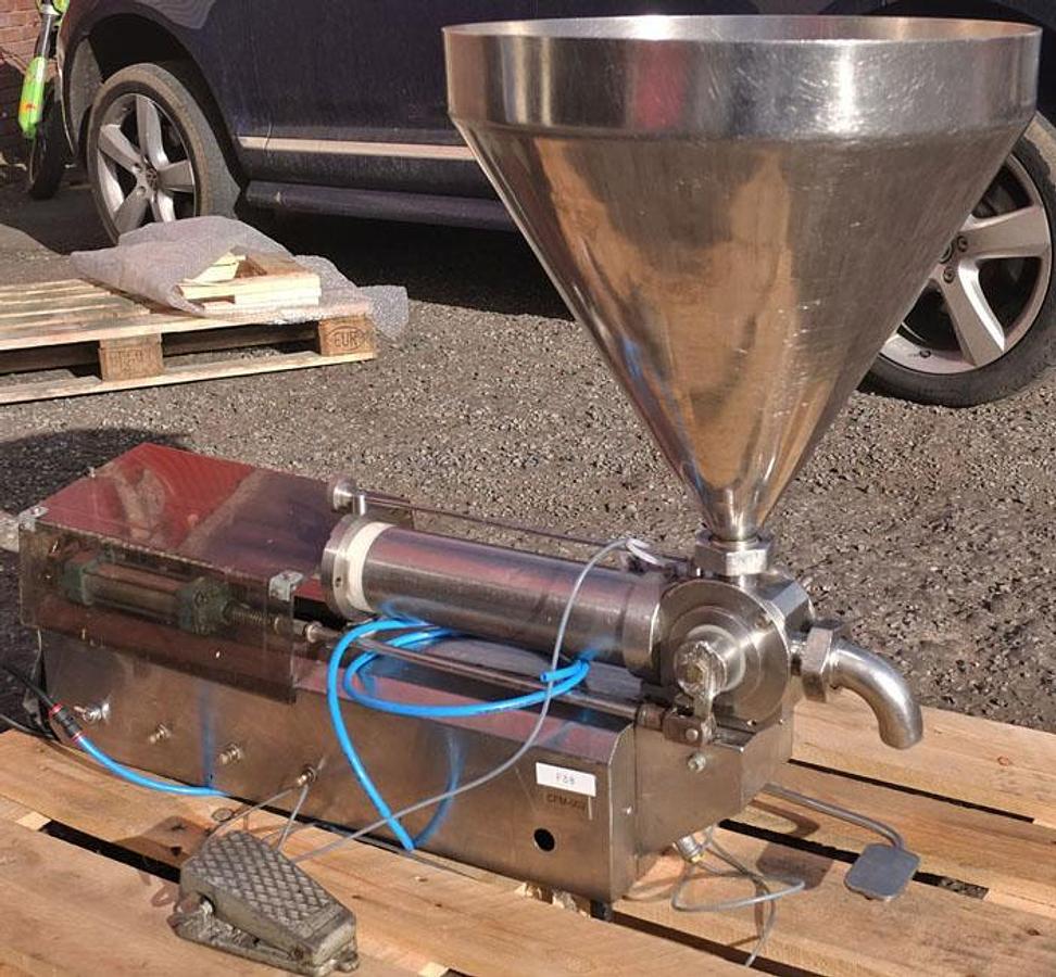 Used Universal Posifill liquid filling machine