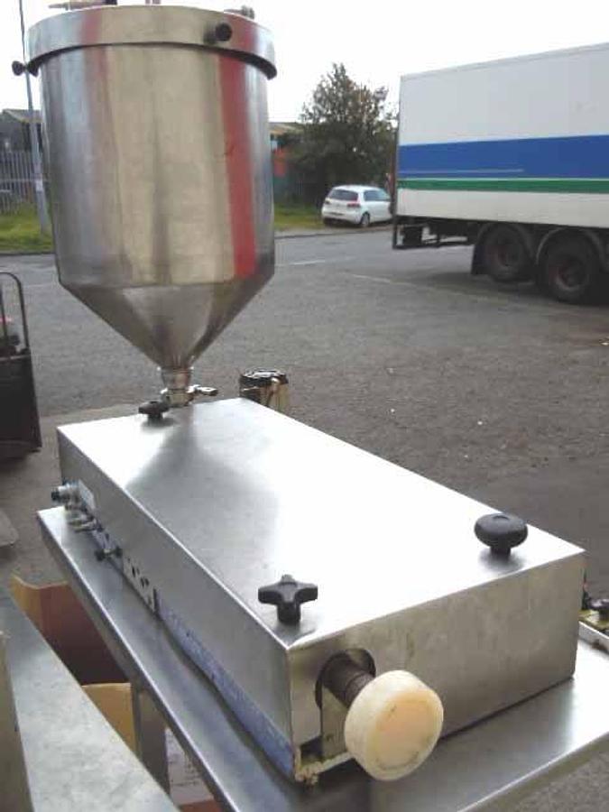 Used Adelphi single head filler