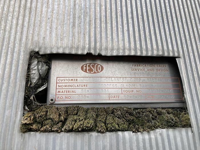 Used Used FESCO approximately 4000 gallon 304 stainless steel vertical storage tank.