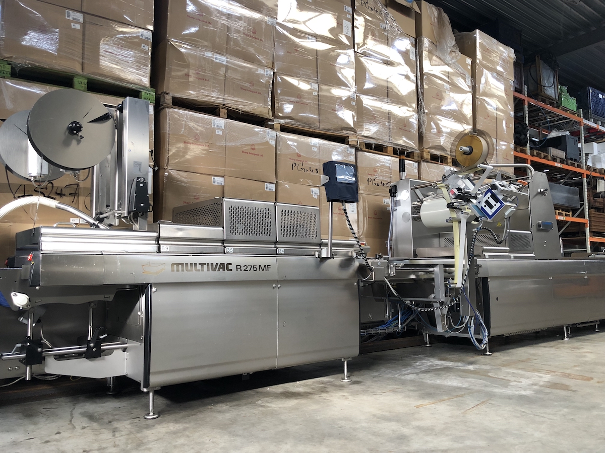Used Multivac R275mf skin-pack thermoformer with automatic labelling machine