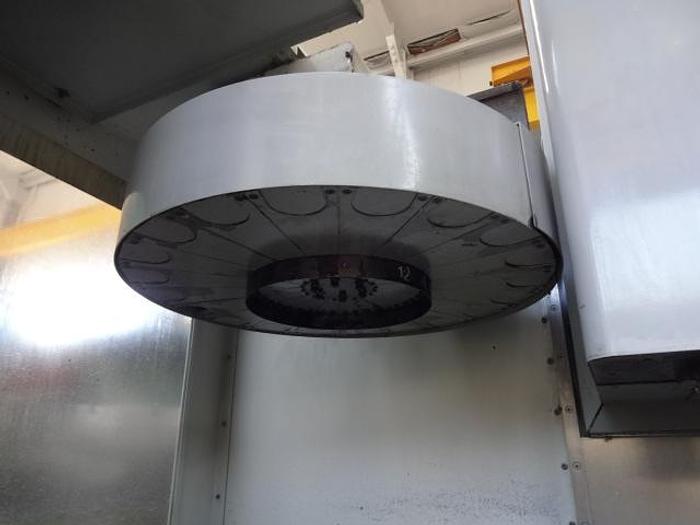 Utilisé Centre d’usinage vertical 3 axes Marque MIKRON – HAAS