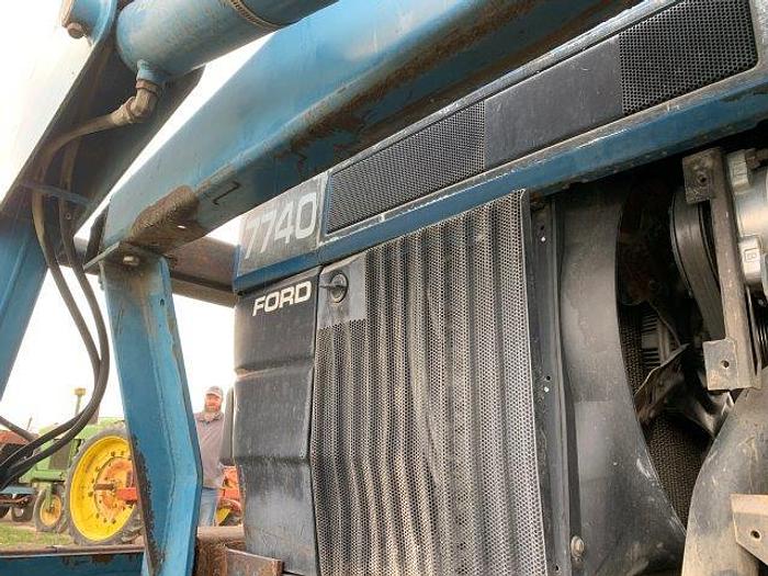 Used New Holland 7740 MFWD Tractor w/ loader