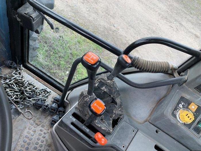 Used New Holland 7740 MFWD Tractor w/ loader