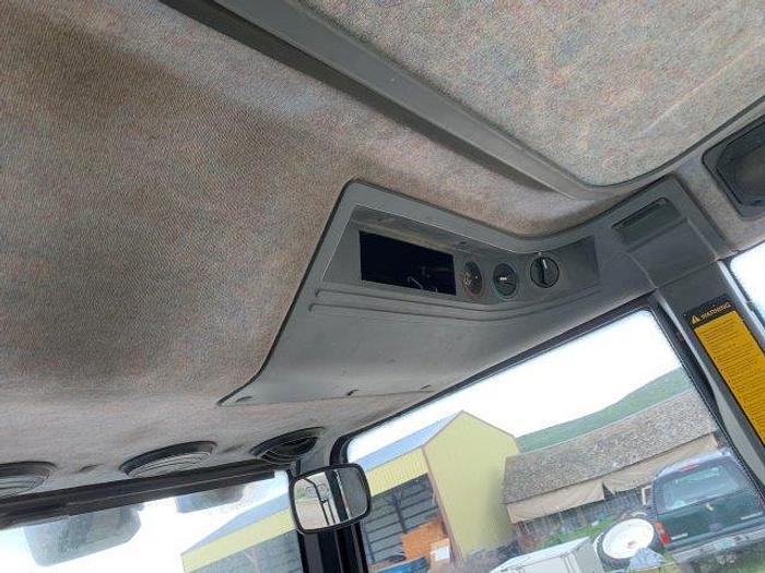 Used New Holland 7740 MFWD Tractor w/ loader