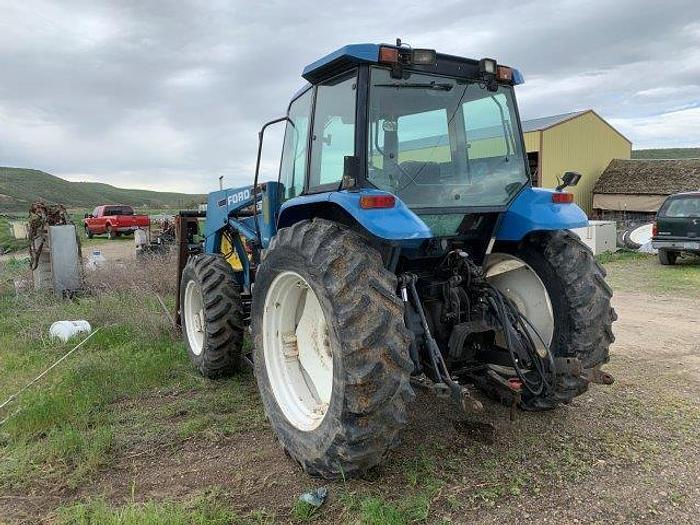 Used New Holland 7740 MFWD Tractor w/ loader