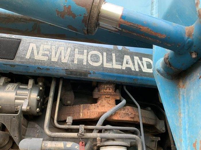 Used New Holland 7740 MFWD Tractor w/ loader