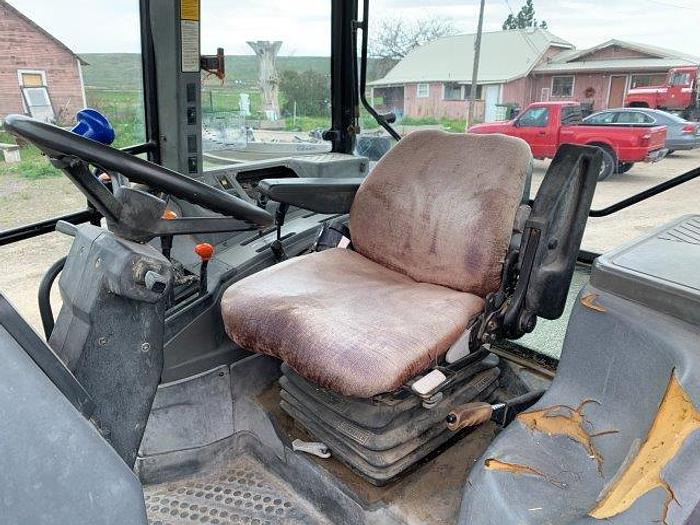 Used New Holland 7740 MFWD Tractor w/ loader