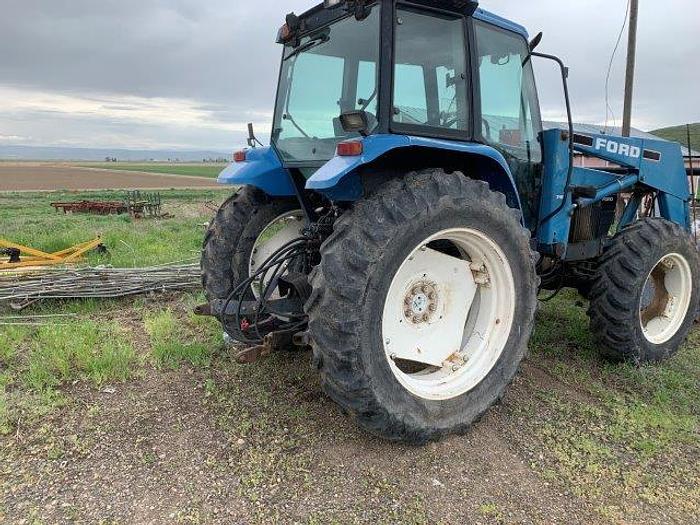Used New Holland 7740 MFWD Tractor w/ loader