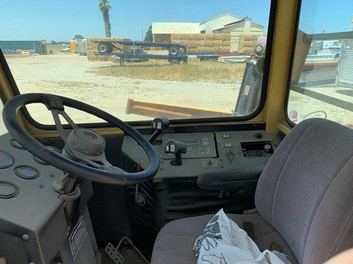 Used New Holland 1095 Bale wagon with Mil-Stak clamp