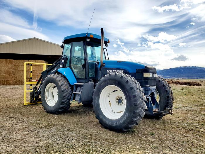 Used New Holland TV140 Bi-Directional Tractor