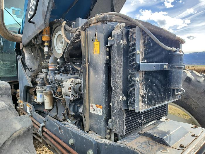 Used New Holland TV140 Bi-Directional Tractor