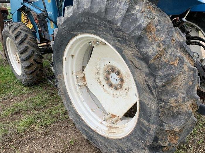 Used New Holland 7740 MFWD Tractor w/ loader