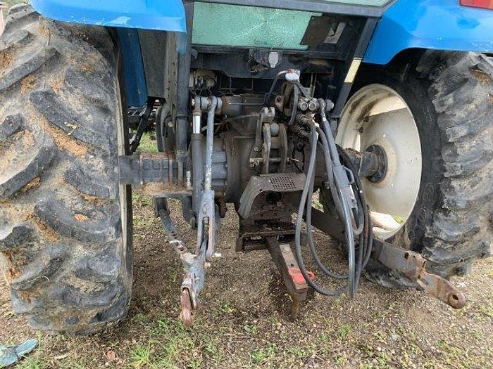 Used New Holland 7740 MFWD Tractor w/ loader