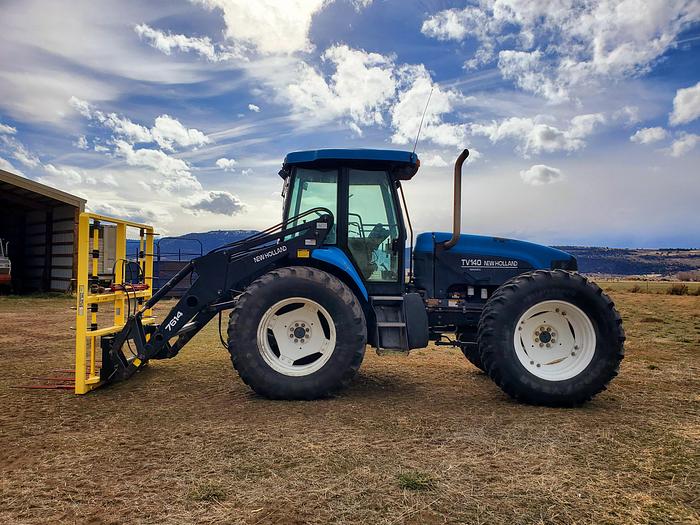 Used New Holland TV140 Bi-Directional Tractor