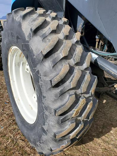 Used New Holland TV140 Bi-Directional Tractor