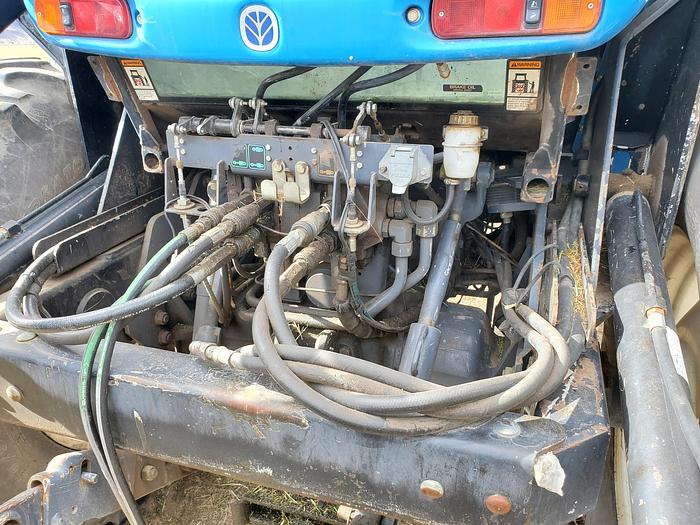 Used New Holland TV140 Bi-Directional Tractor