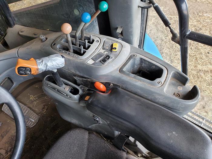 Used New Holland TV140 Bi-Directional Tractor