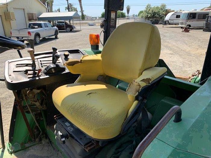 Used John Deere 7400 MFWD Tractor