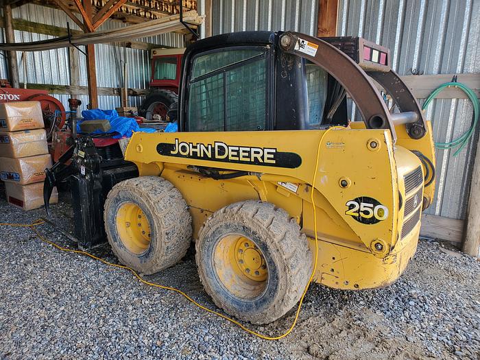 Used John Deere 250 Skid Steer w/ 4 Attachments
