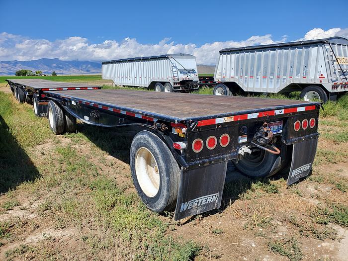 Used 2016 Western Flatbed Triple Trailer Set - 30' + 24' + 24'