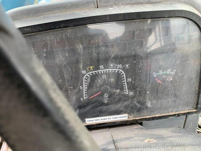 Used New Holland 7740 MFWD Tractor w/ loader