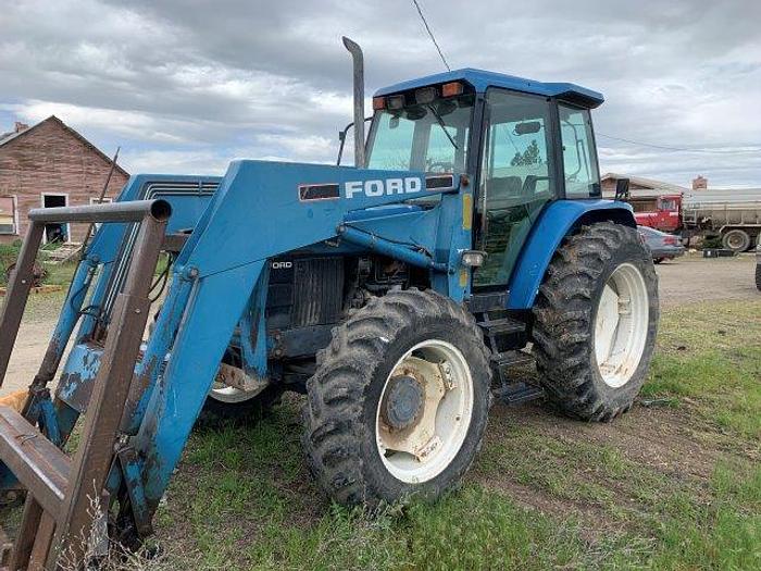 Used New Holland 7740 MFWD Tractor w/ loader
